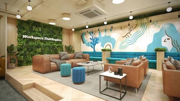 A lounge with sofas and a mural